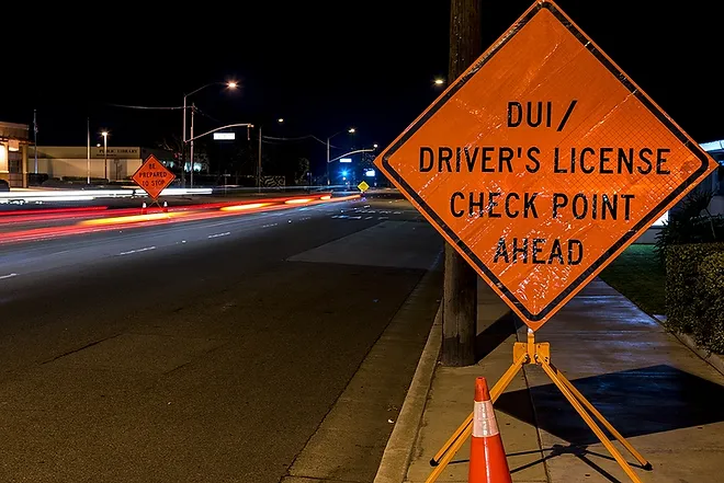 Image of Street with DUI Driver's License Check Point Ahead sign